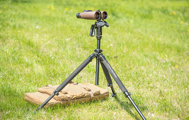 Tactical Tripod Kit Bag in field with binoculars and tripod