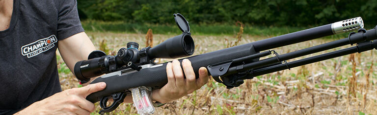 Shooter holding rifle with Champion Bipod attached