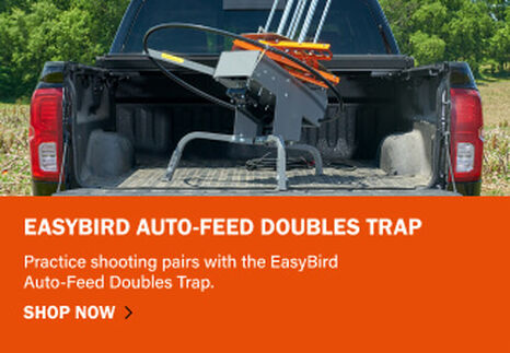 EasyBird Auto-Feed Doubles Trap loaded in the pack of a pick-up truck