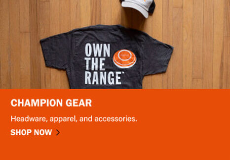 Champion Apparel on wooden background